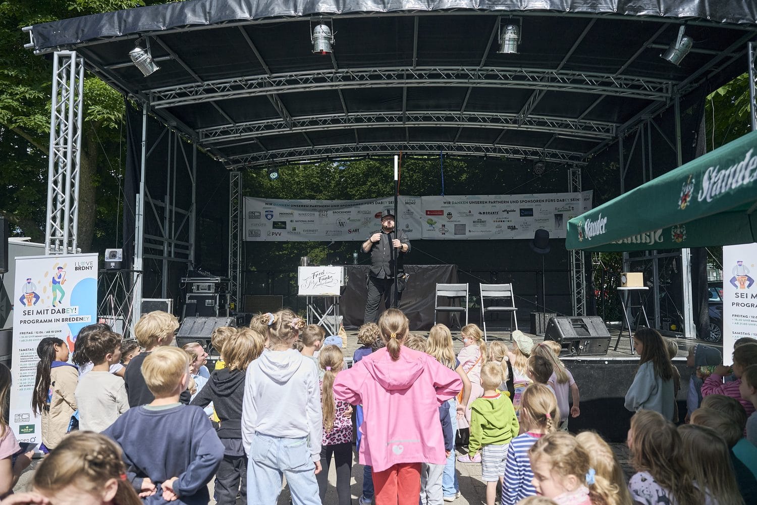 Fred Funke auf der Bühne bei einem Stadtteilfest in Essen